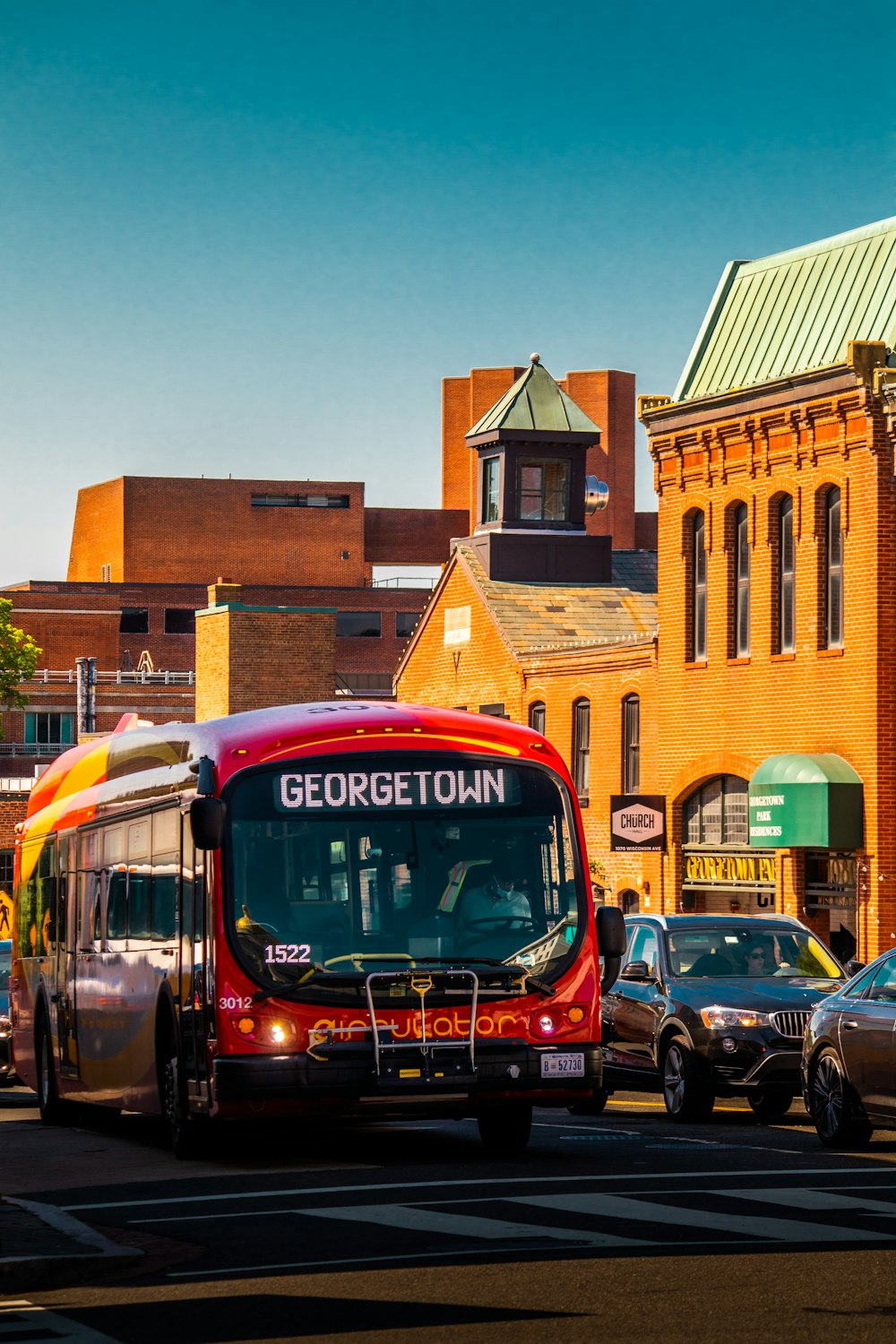 a bus driving down the street