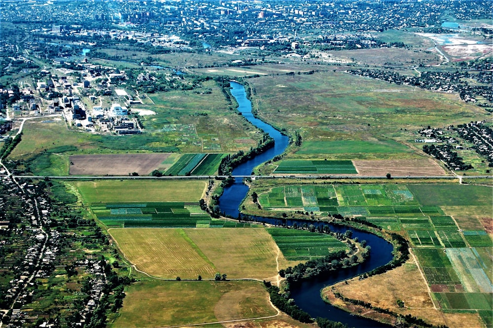 an aerial view of a road and fields