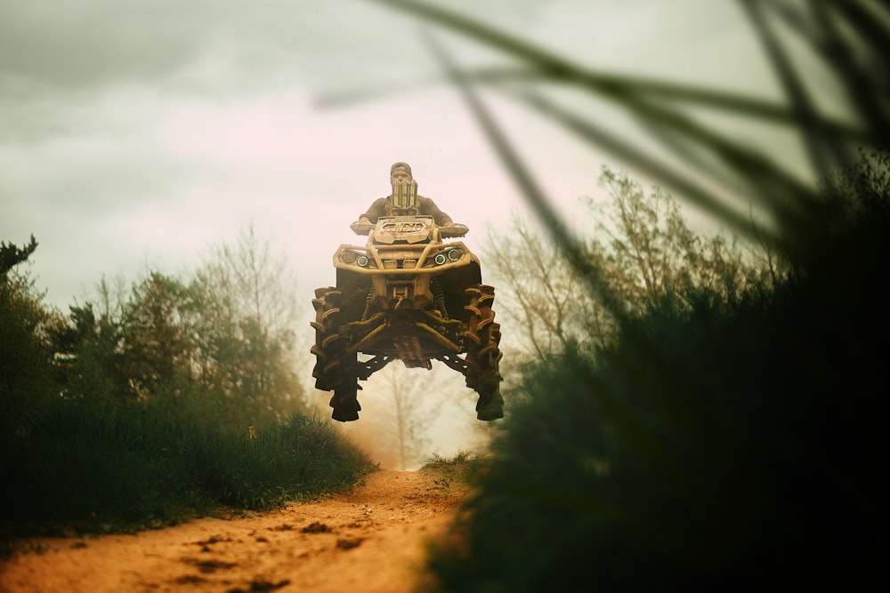 a tank driving through a forest