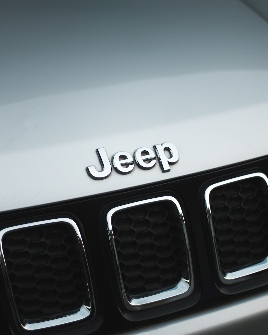 The Jeep Compass is a compact SUV known for its rugged capability and sleek design.