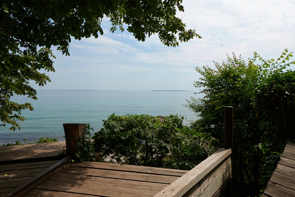 a wooden deck overlooking a body of water