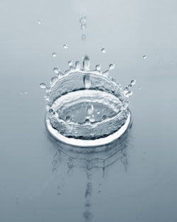 a glass bowl with water drops