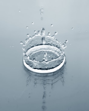 a glass bowl with water drops