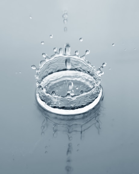a glass bowl with water drops