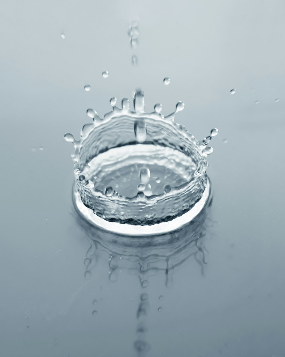 a glass bowl with water drops