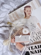 A stunning flat lay of a model’s portfolio with elegant lingerie and swimwear photos