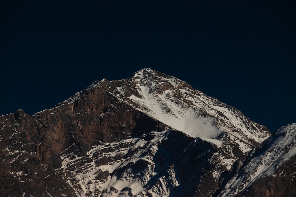 a mountain with snow