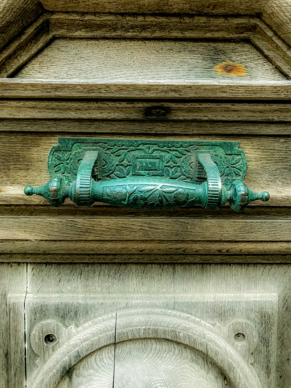 a metal object on a wooden surface