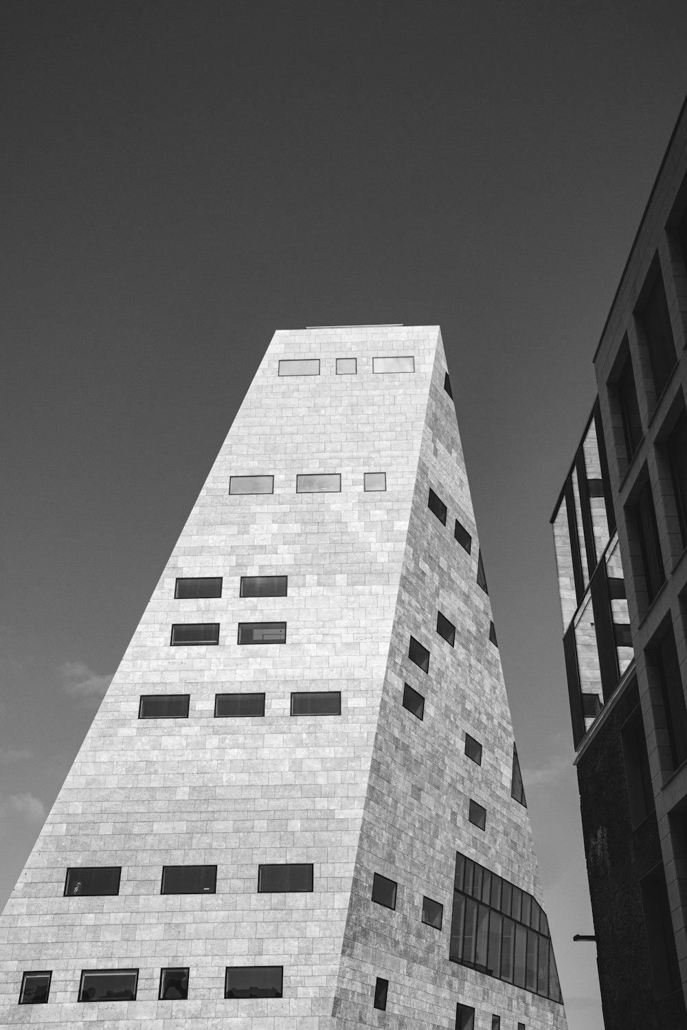 a tall building with a dark sky