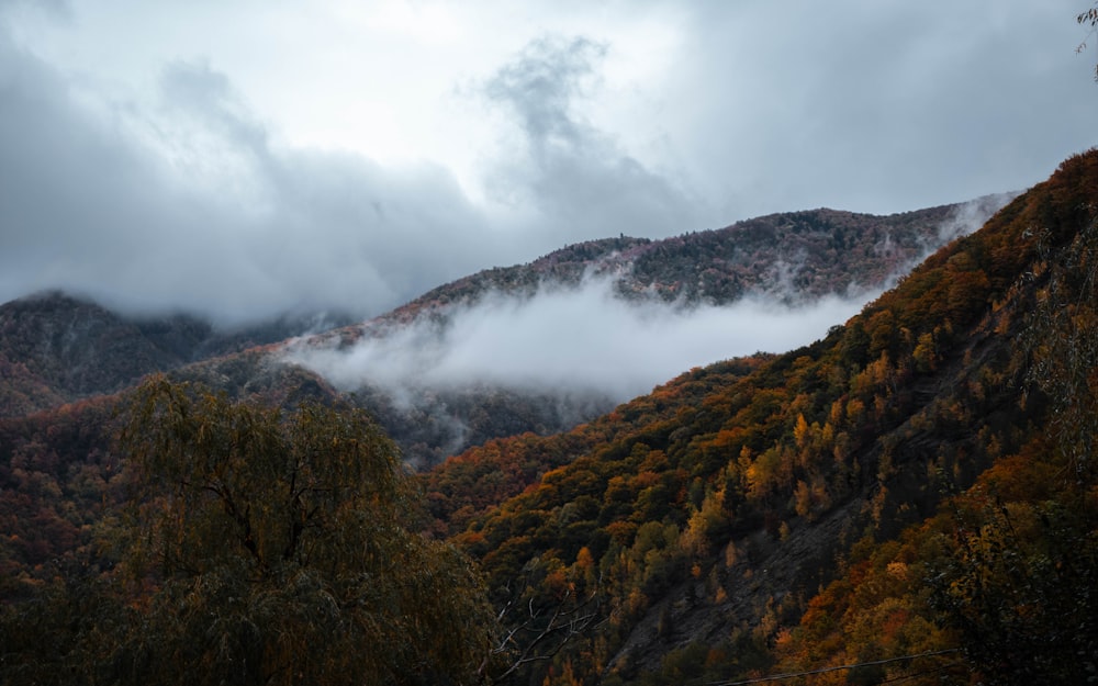 a mountain with clouds