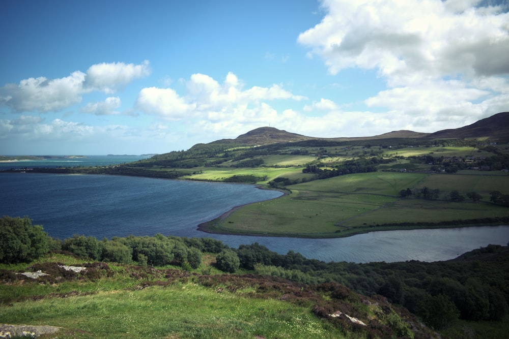 a lake surrounded by hills