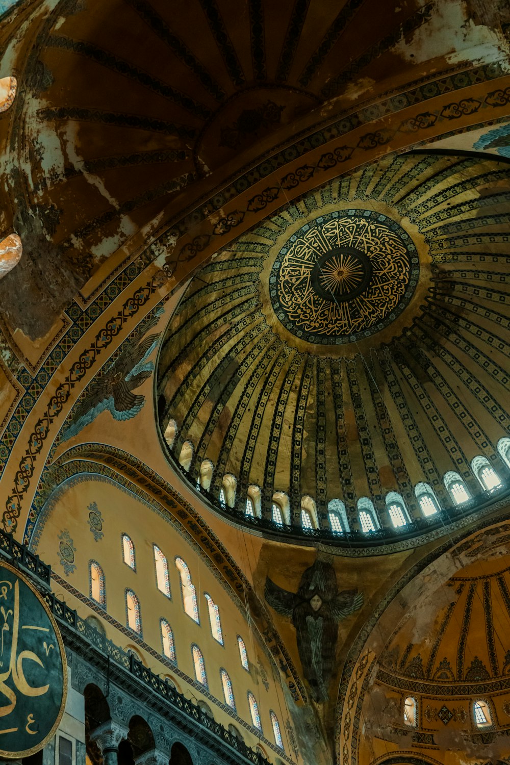 a domed ceiling with a large arched window