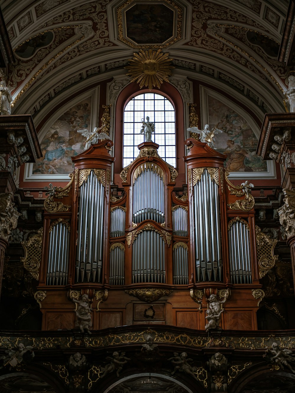 a large ornate room with a large window