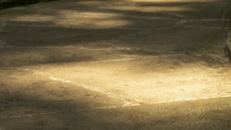 A bright floor solar light casting gentle light over a patio
