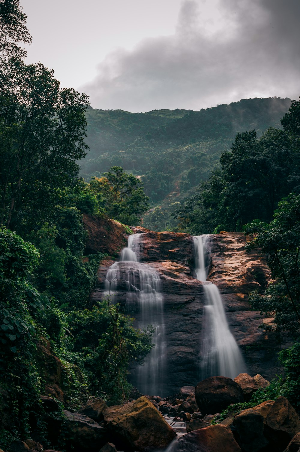 a waterfall in a forest