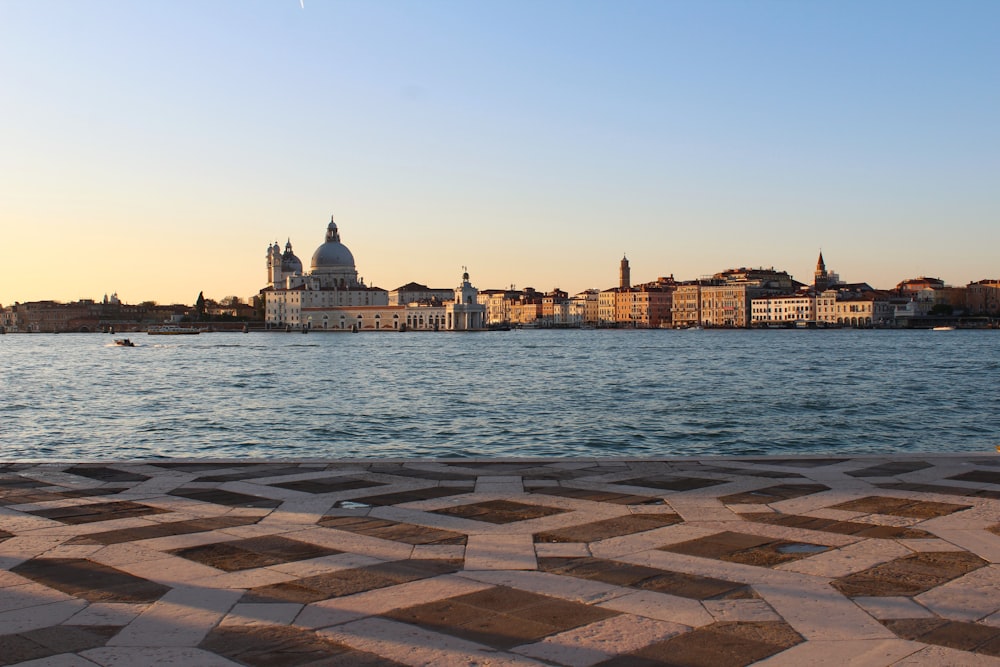 a body of water with buildings along it