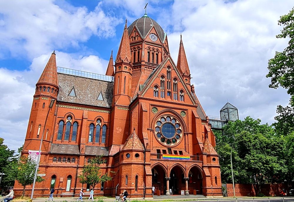 a large brick building with a clock on it