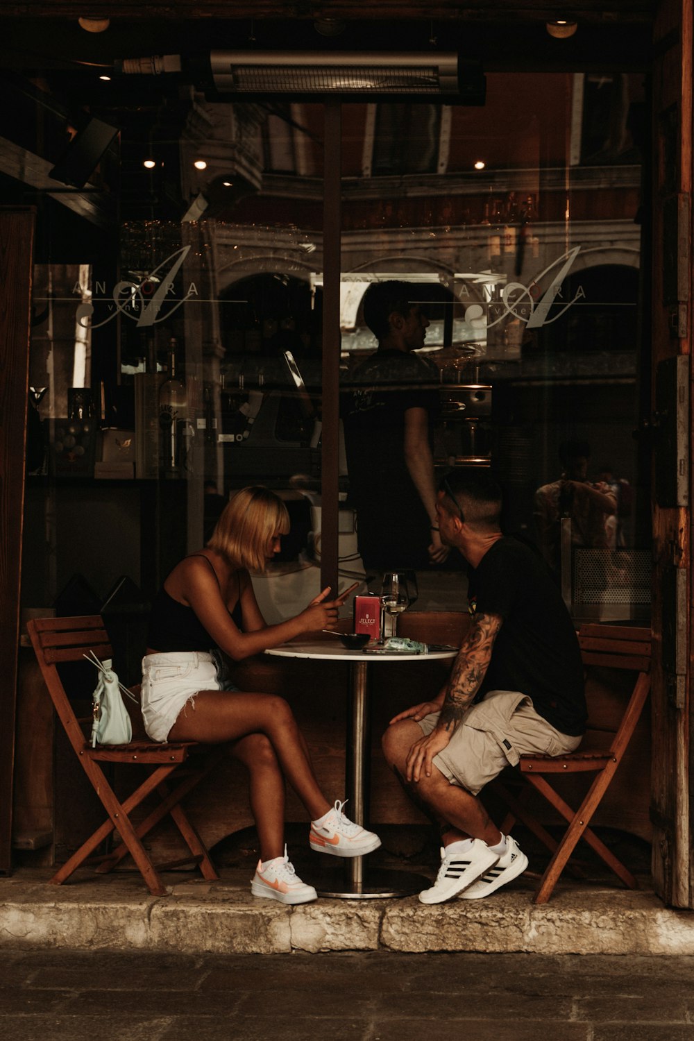 a group of people sitting at a table