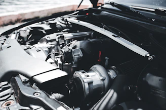 a car engine with the hood open