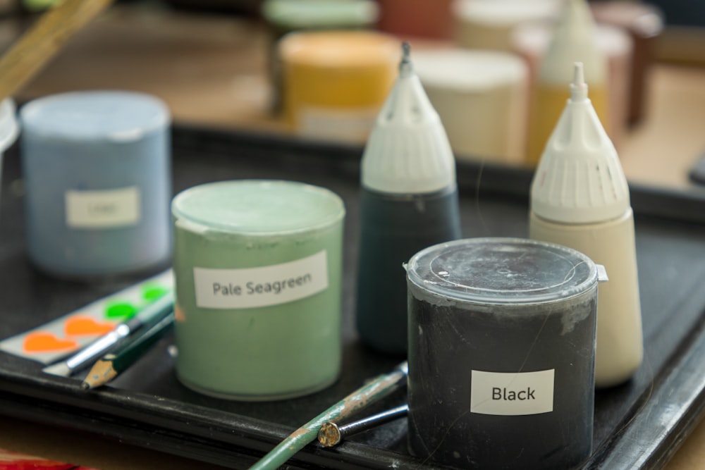 a group of bottles and containers