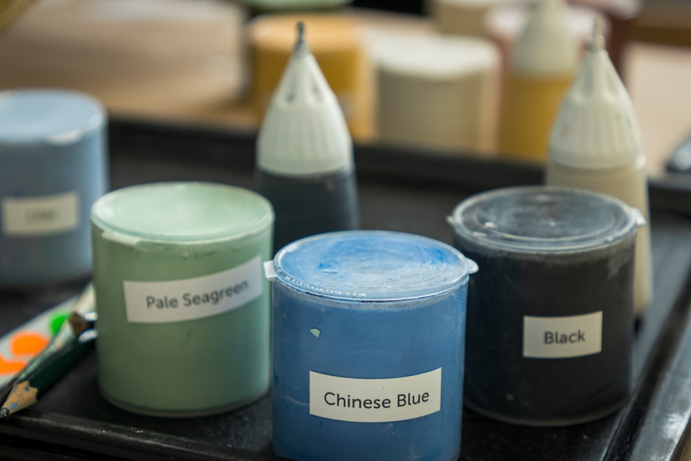 a group of containers with labels