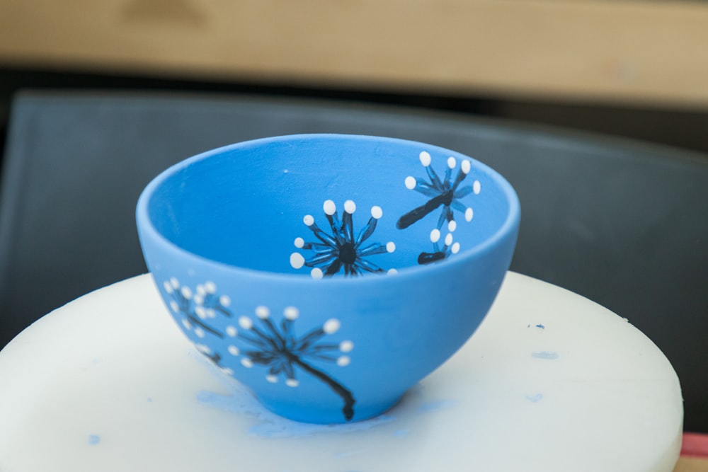 a blue bowl with water in it