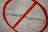 An anti-discrimination sign is depicted with the word 'Diskriminierung' crossed out in red. The background is a plain white, and the letters are bold and black.