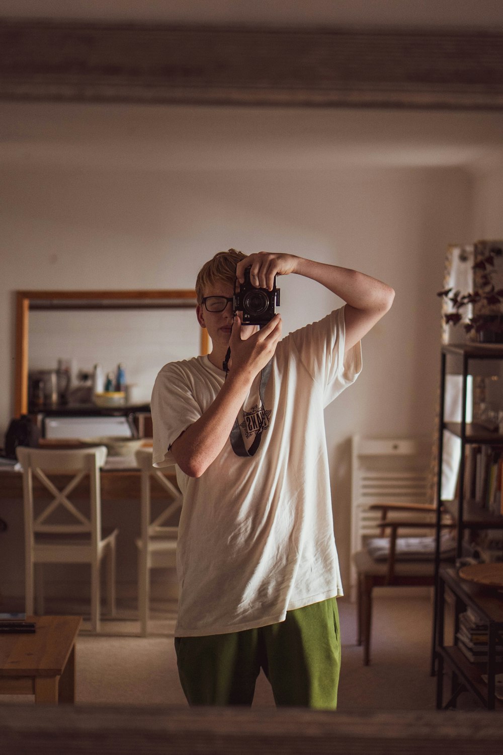 a person holding a camera