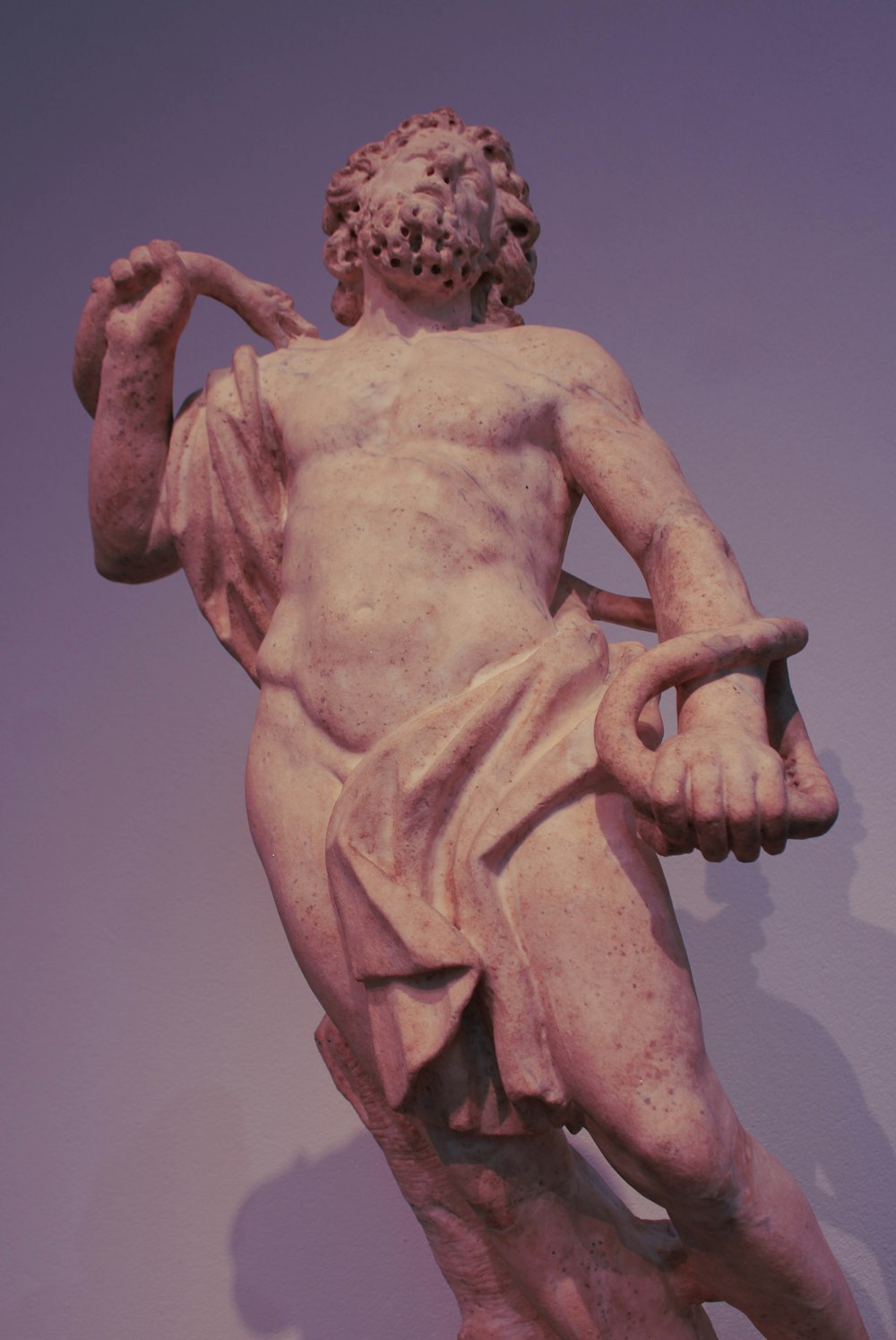 a sculpture of a naked man