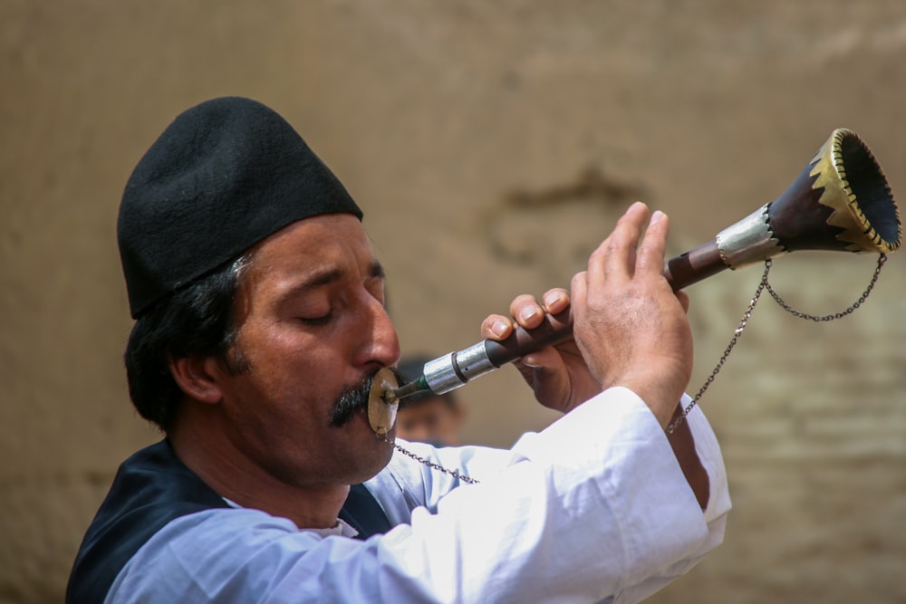 a man playing a flute