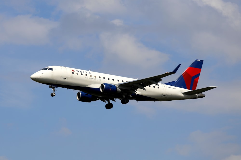 a large airplane flying in the sky