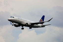 a large airplane flying in the sky