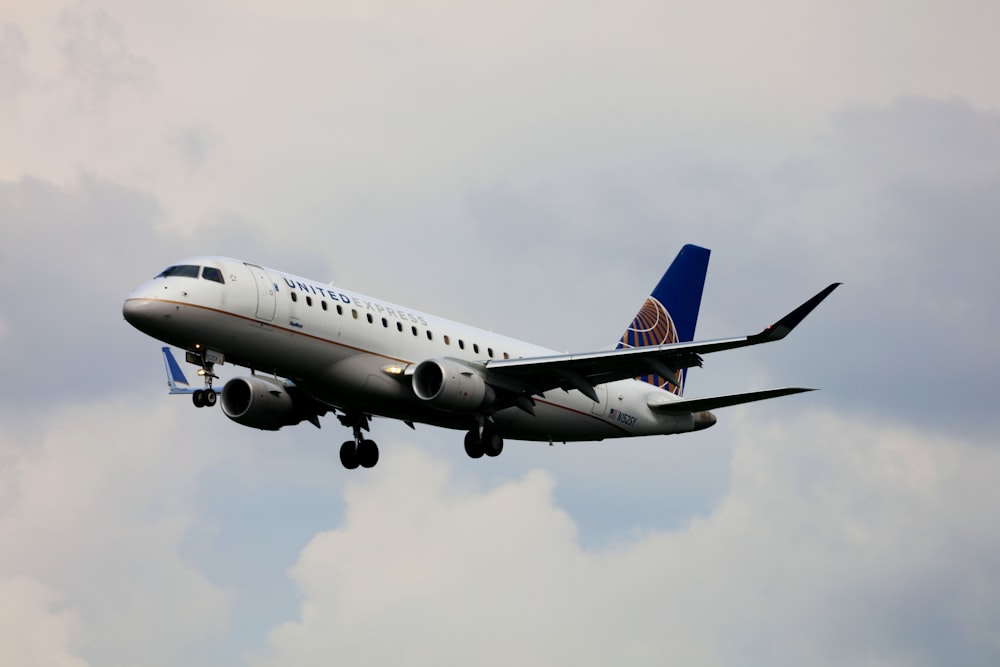 a large airplane flying in the sky