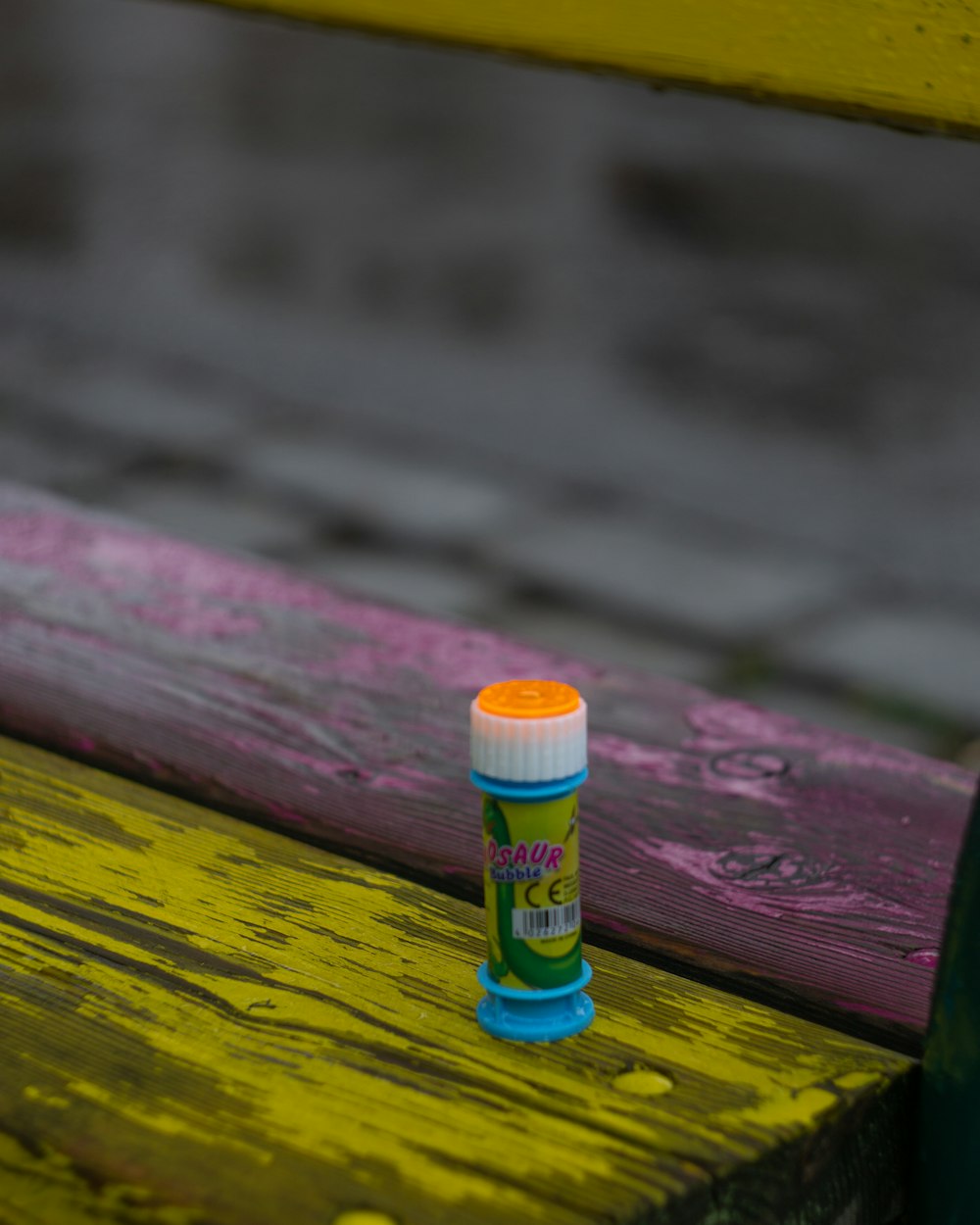 a bottle of liquid on a table