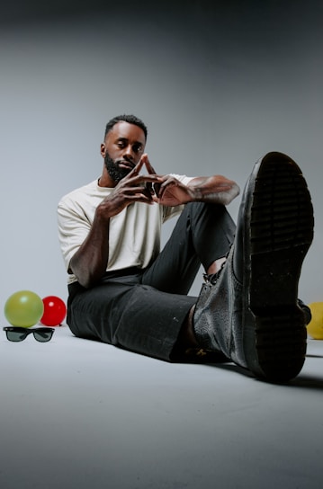 a man sitting on the floor
