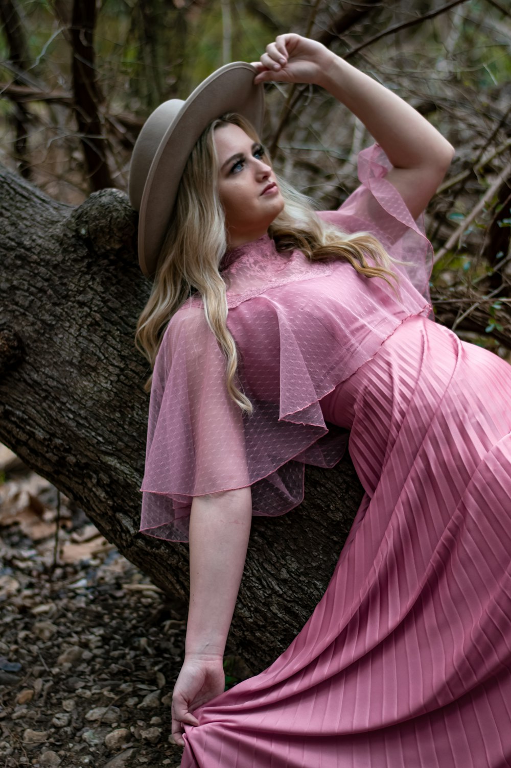 a woman in a pink dress