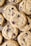 Close-up of freshly baked cookies on a rustic wooden table.