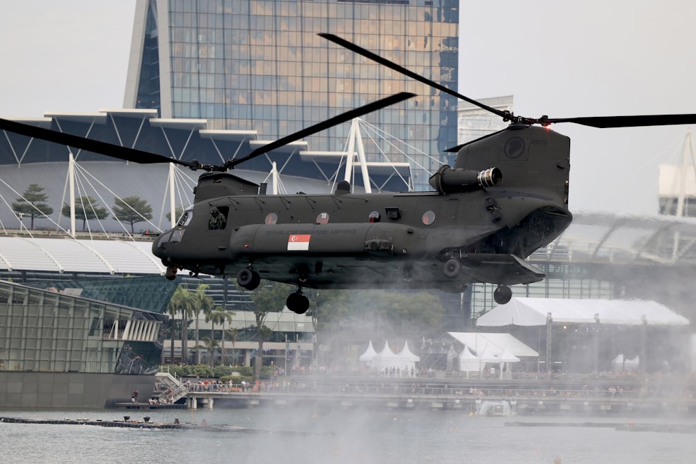 a helicopter flying over a city