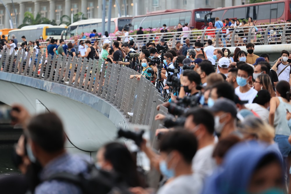 a crowd of people in a street