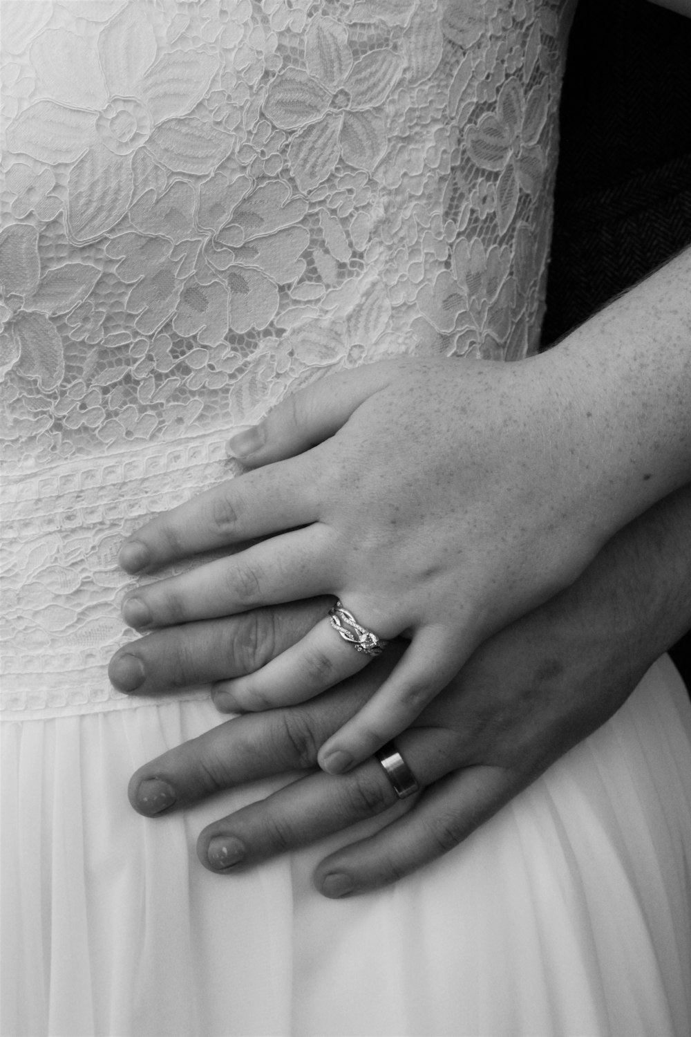 a woman's hands with a ring on her finger