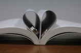 An open book with heartfelt love letters inside.