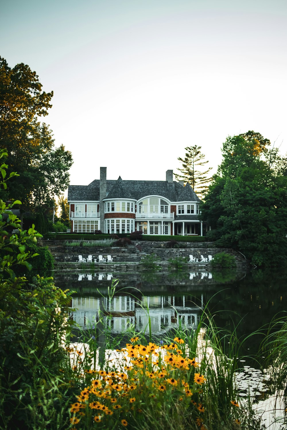 a large house with trees around it