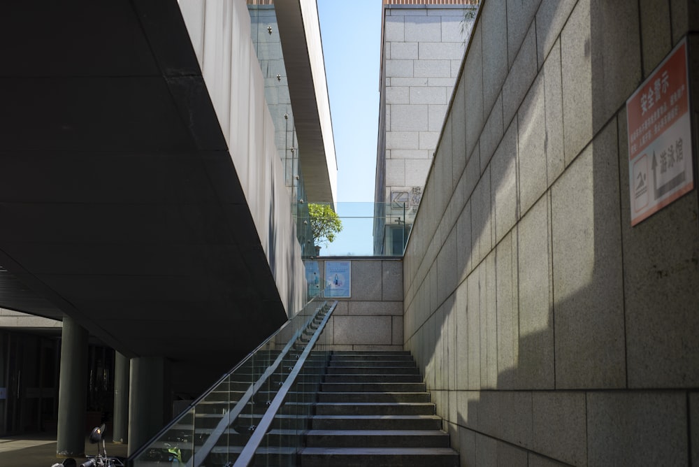a staircase between two buildings