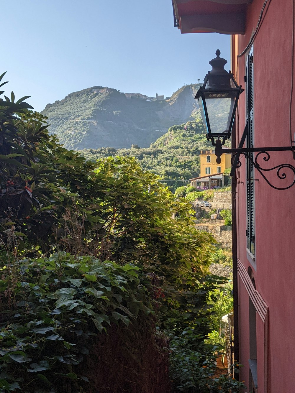 a lamp post on a hill