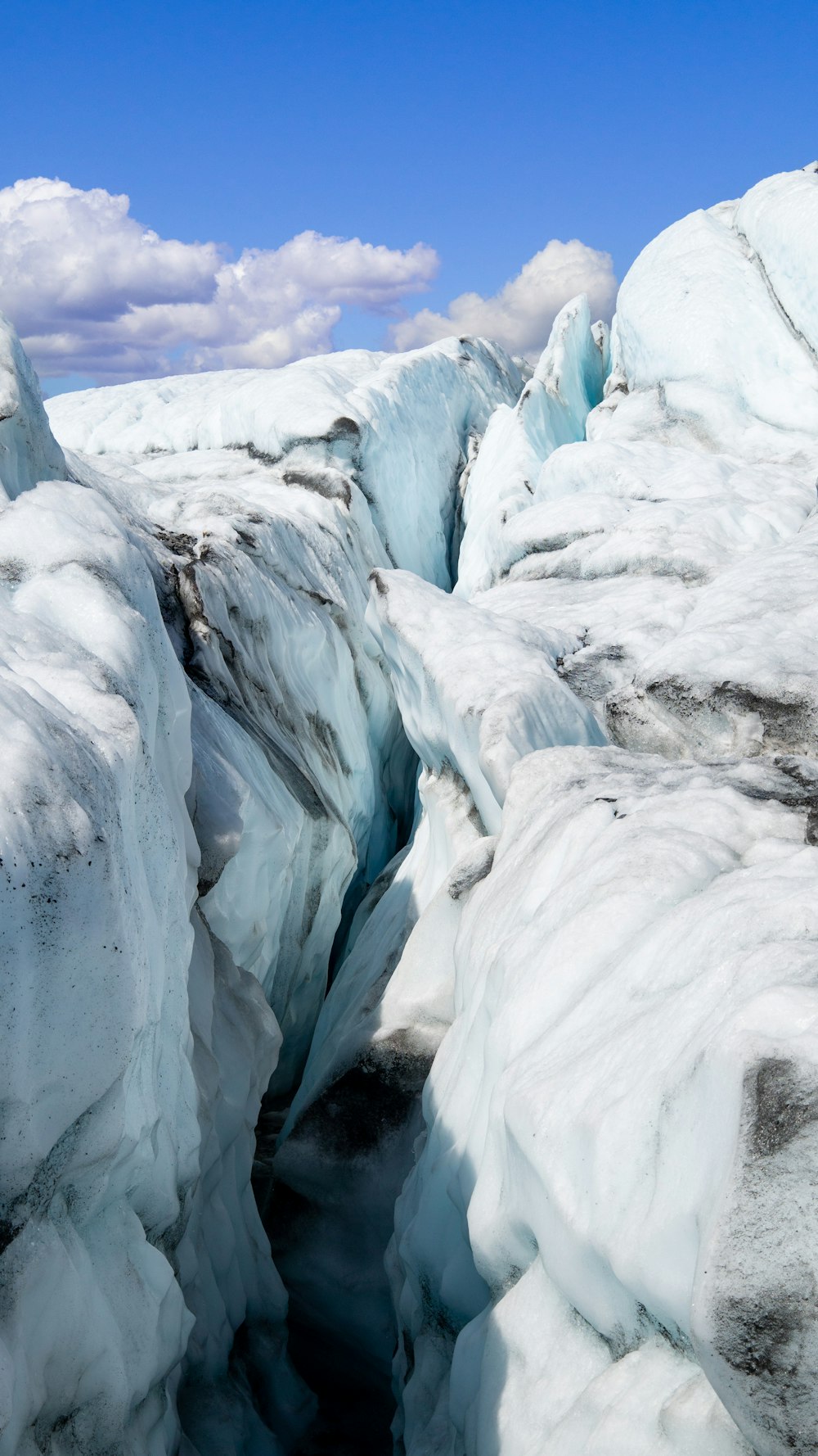 a large glacier with ice