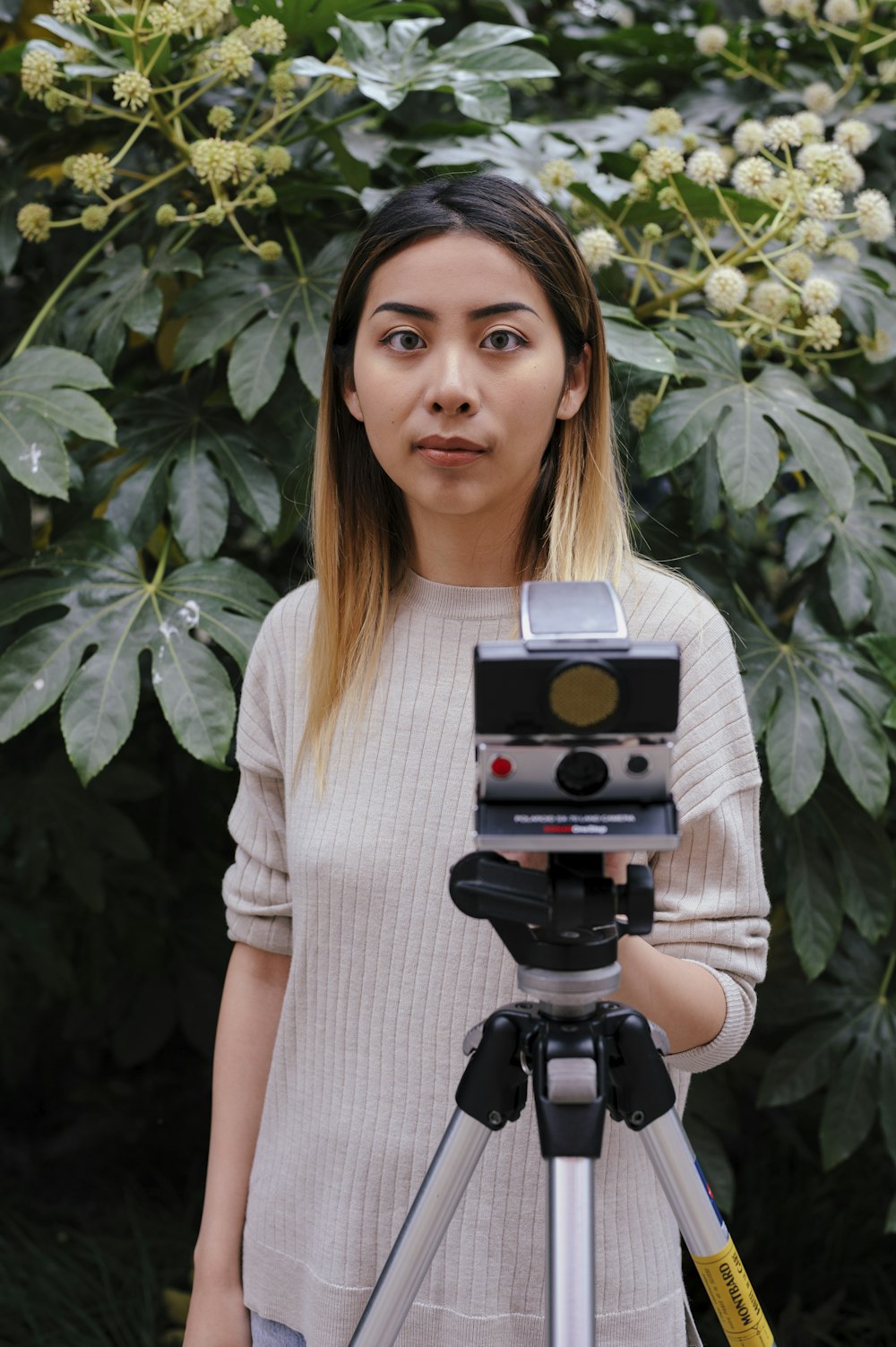 a person holding a camera