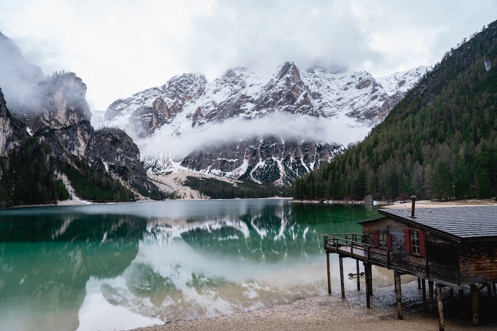 a lake with mountains in the background