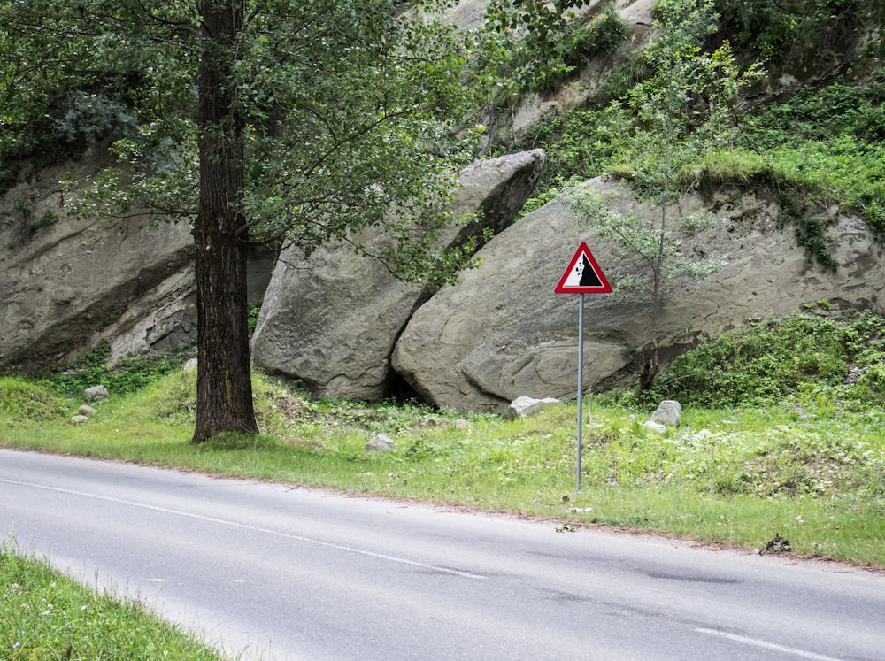 a road sign on the side of a road