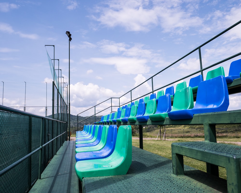 a playground with blue benches