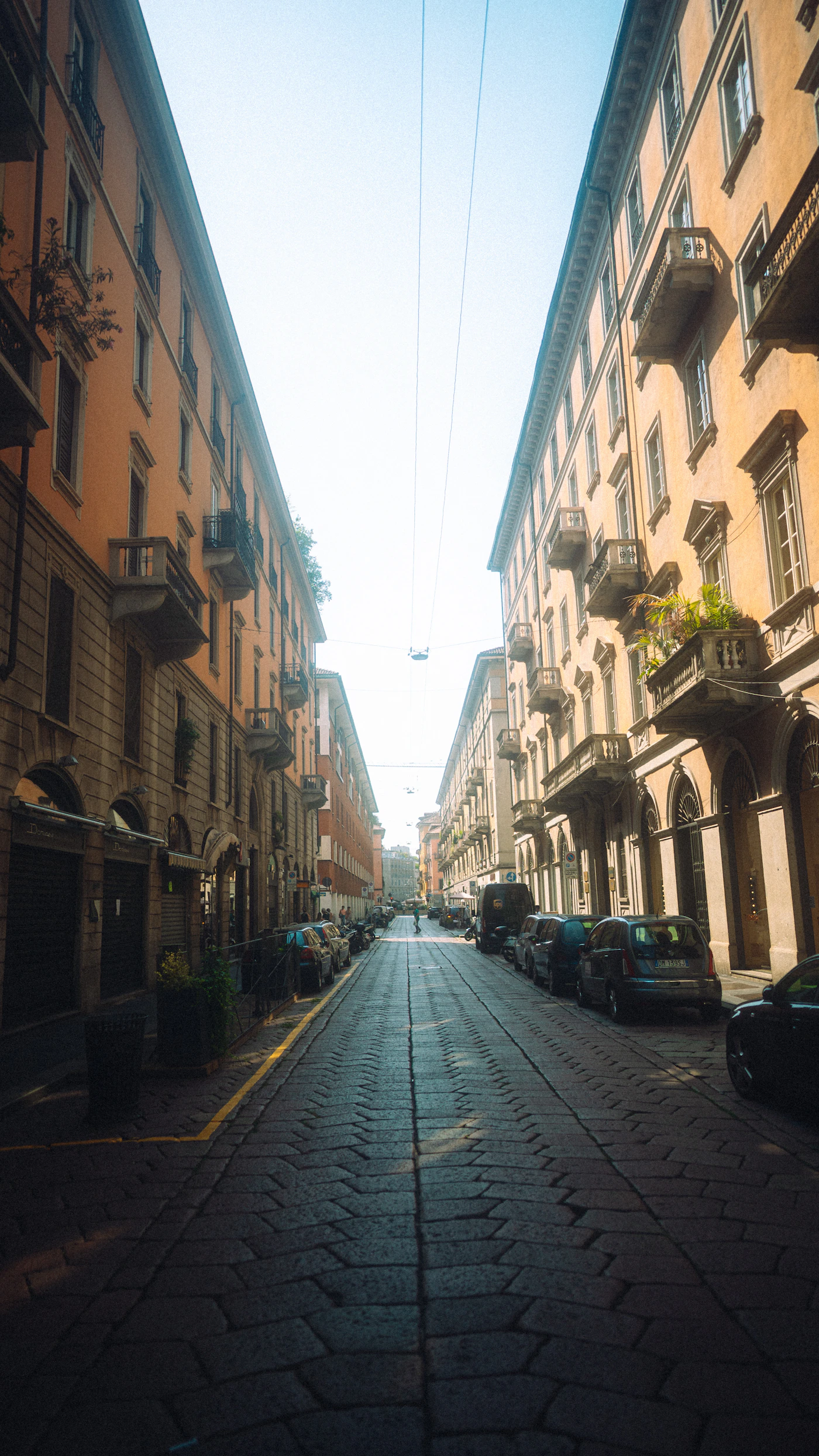 Balconies and buildings on a Milan street